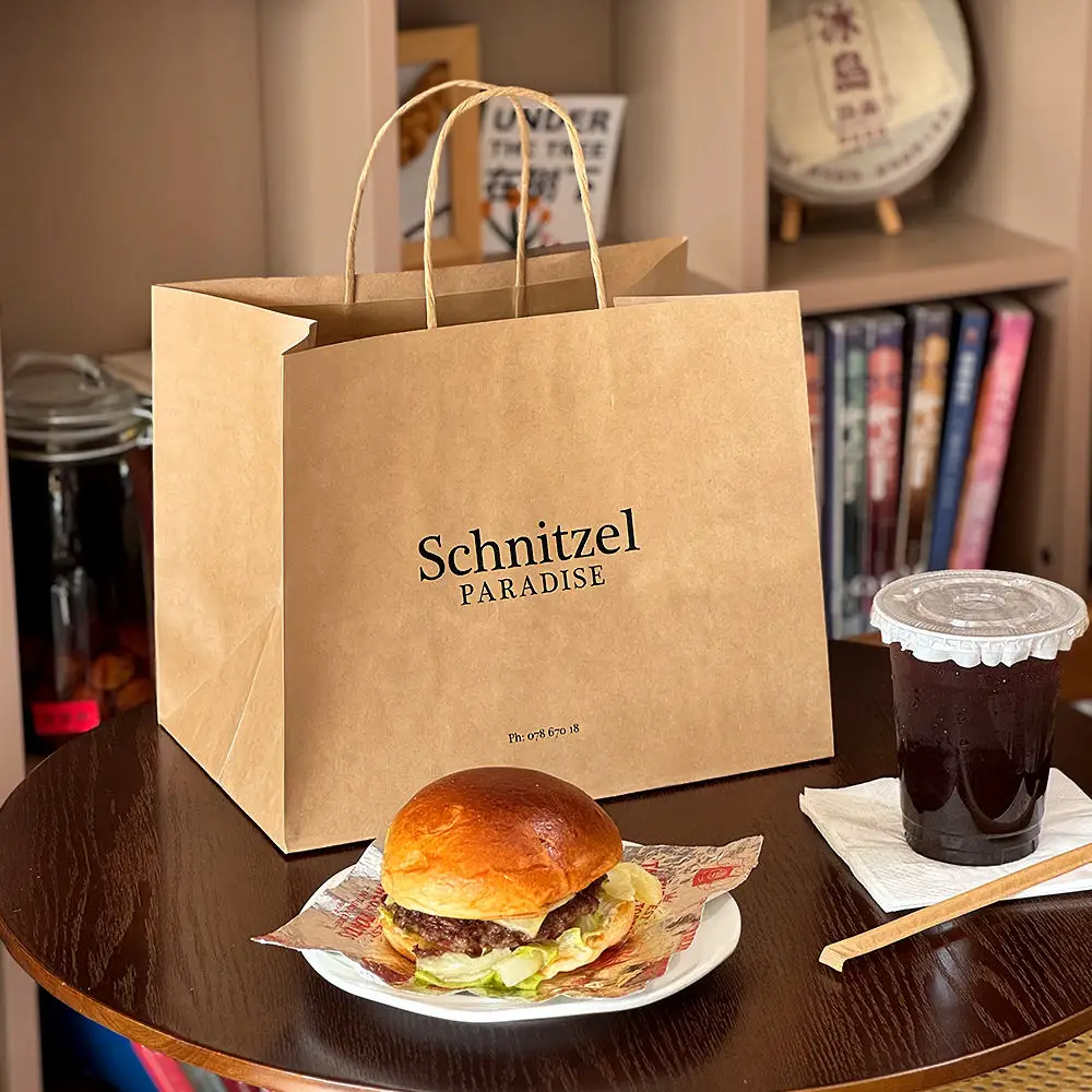 Greaseproof Fried Food Bags - Brown kraft paper bag with burger and drink, twisted handle, custom restaurant logo
