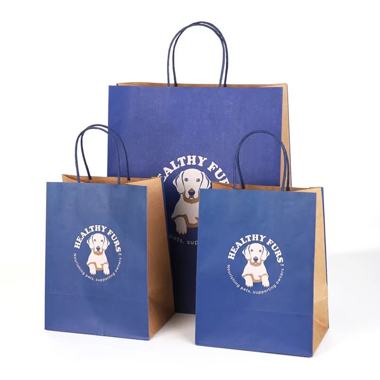 Grocery & Retail Shopping Bags - Navy kraft paper bags with custom printed logo