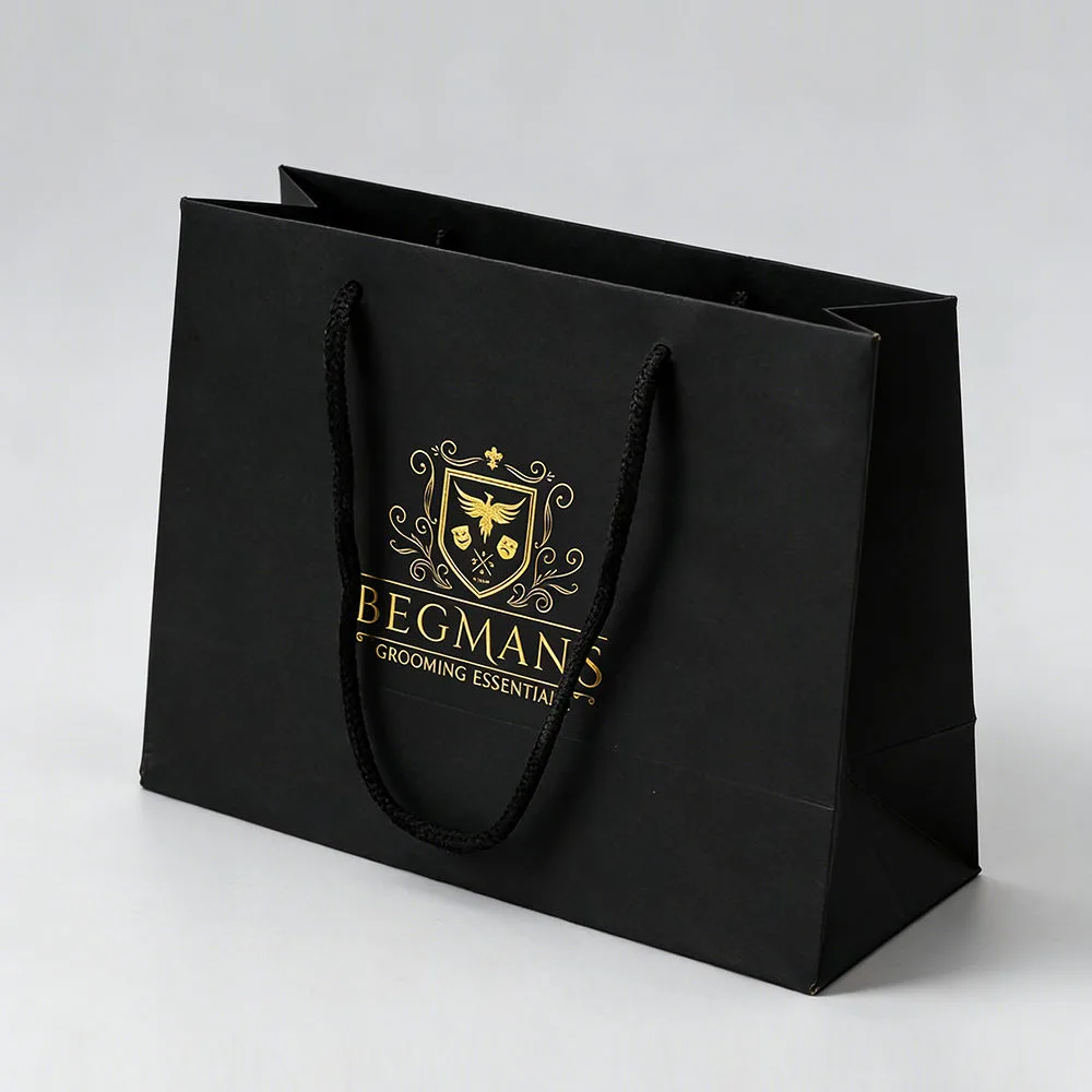 Black luxury paper bag with gold hot stamping logo and cotton rope handle