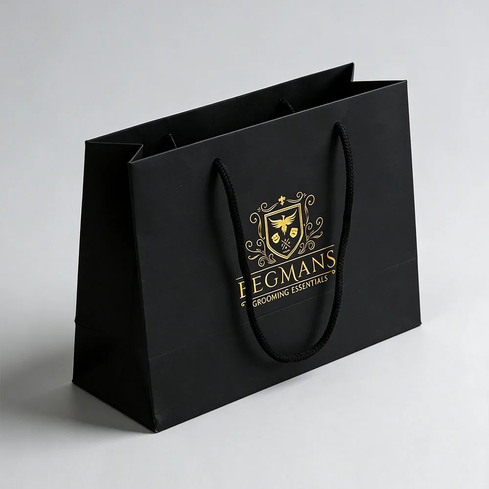 Luxury Boutique Hot Foil Bags - Black kraft luxury bag with gold foil stamping brand logo, front view