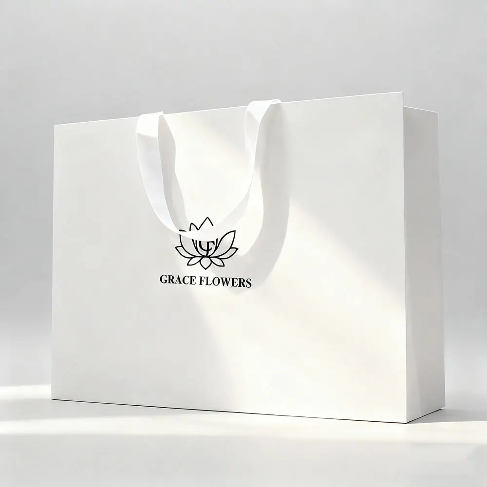 Luxury white ivory board gift bag with ribbon handle and custom logo