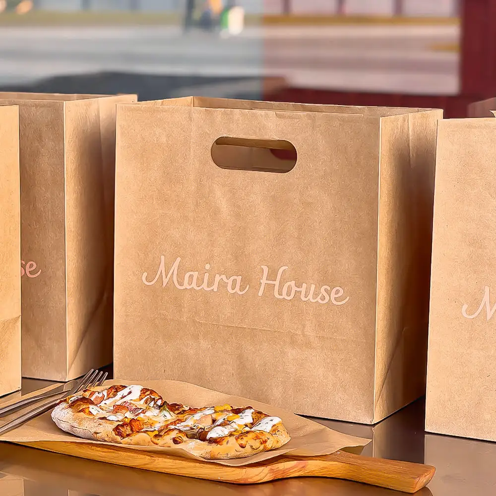 Restaurant Fast Food Delivery Bags - Multiple brown kraft takeaway bags with custom logo, die-cut handles
